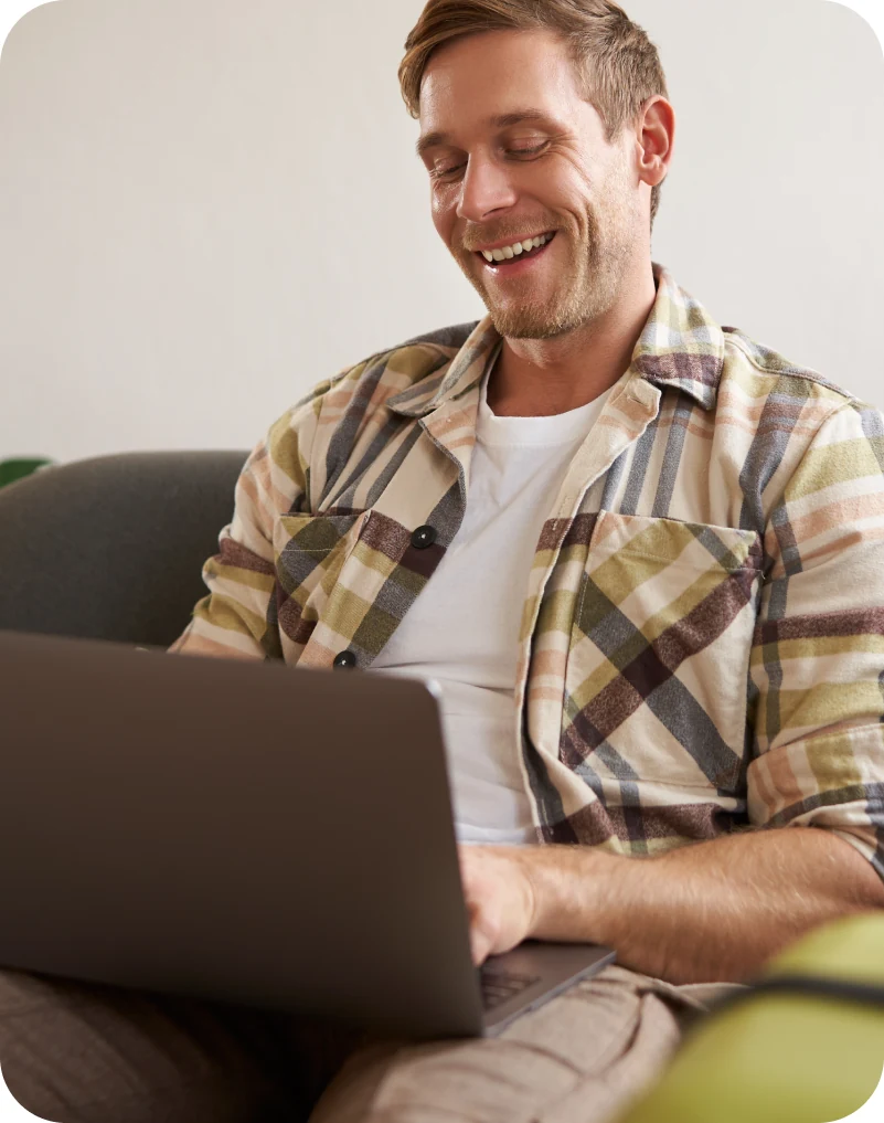 Customer writing a product review on a laptop